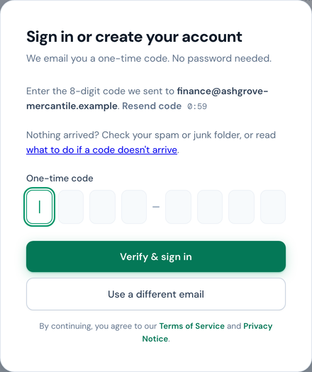 The sign-in dialog's code step: the address the code went to with a Resend code link, the 8-digit code field, Verify and sign in, and Use a different email.